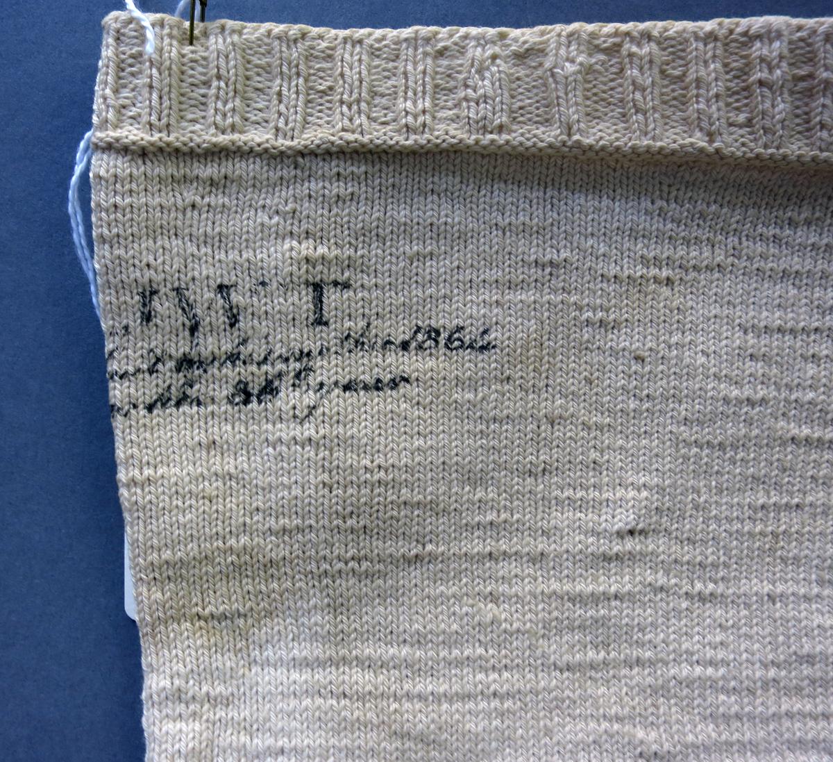1994.0107.055 A Stocking, Inscription