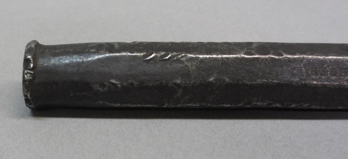 1995.0006.073 Cold chisel, base detail view
