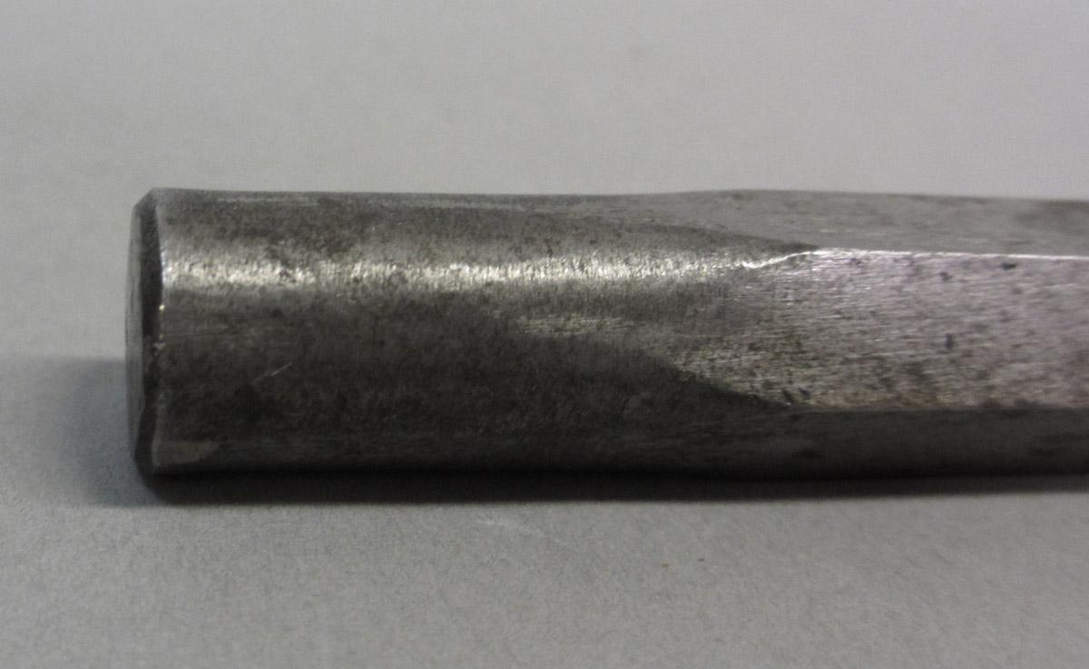 1995.0006.076 Center punch chisel, base detail view