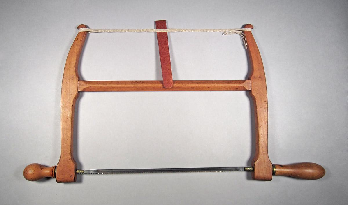 1995.0006.243 A-E, Frame saw, side 2