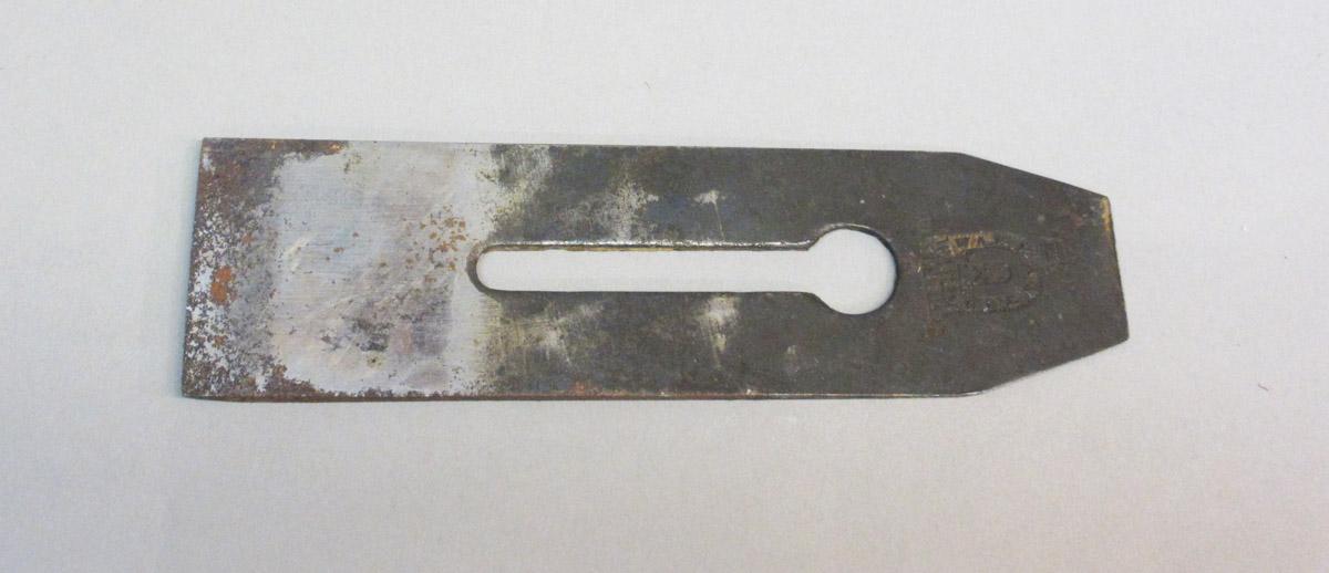 1995.0006.294 Plane blade, Cutter view 1
