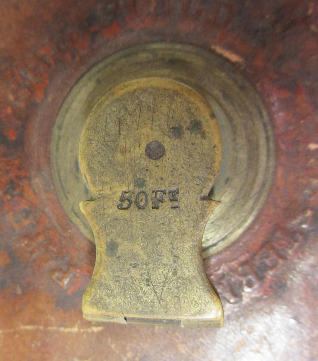 1995.0006.337 Measuring tape, handle detail