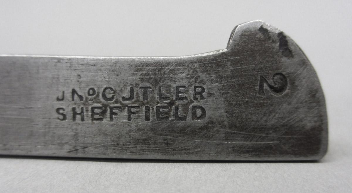 1995.0006.353 Plow plane iron, mark detail