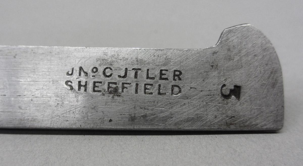 1995.0006.354 Plow plane iron, mark detail