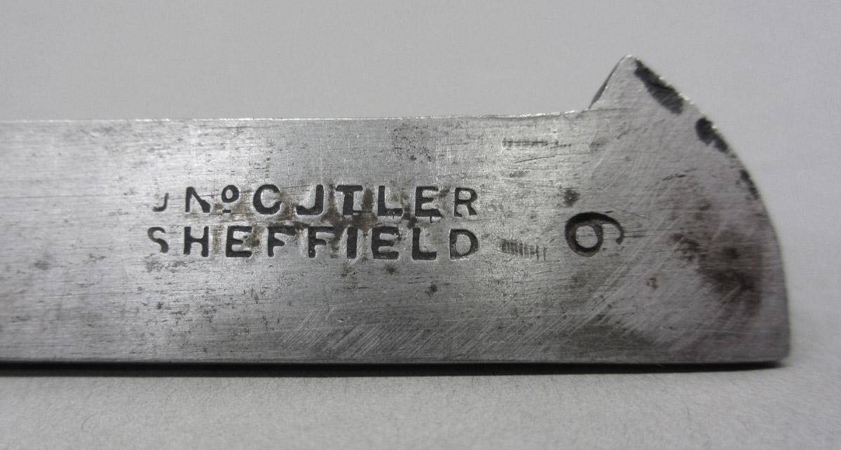 1995.0006.357 Plow plane iron, mark detail