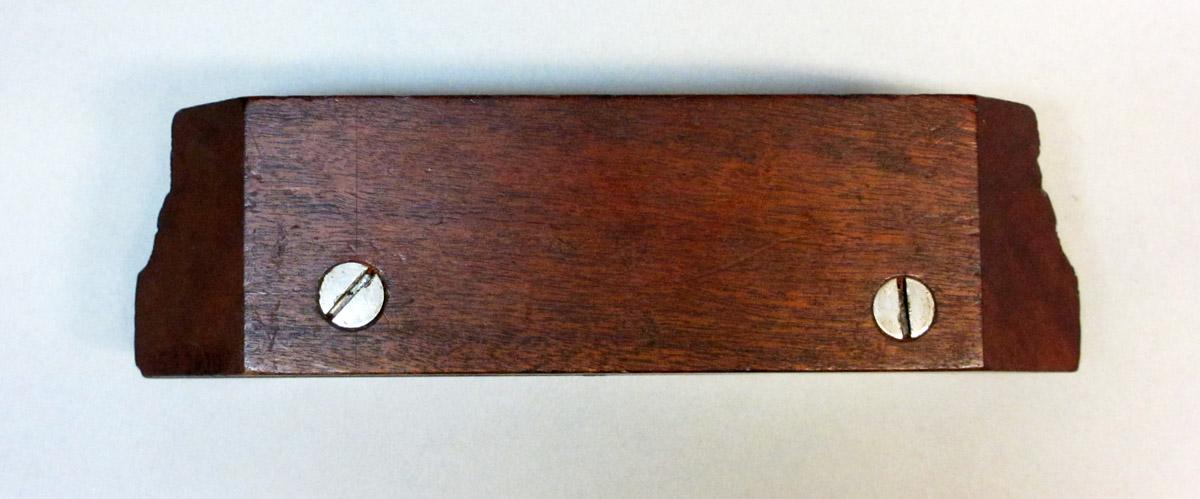 1995.0006.363 Mitre Saddle Template, Side 1