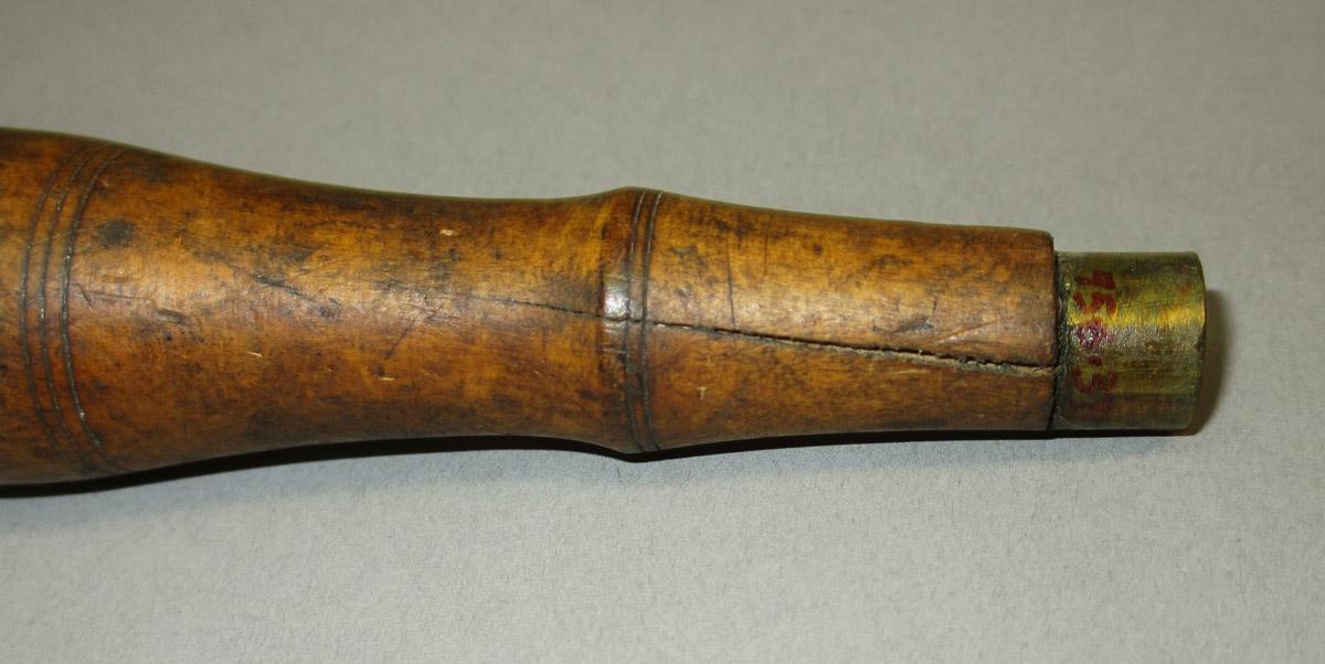 1995.0006.371 Chisel handle, detail view 1