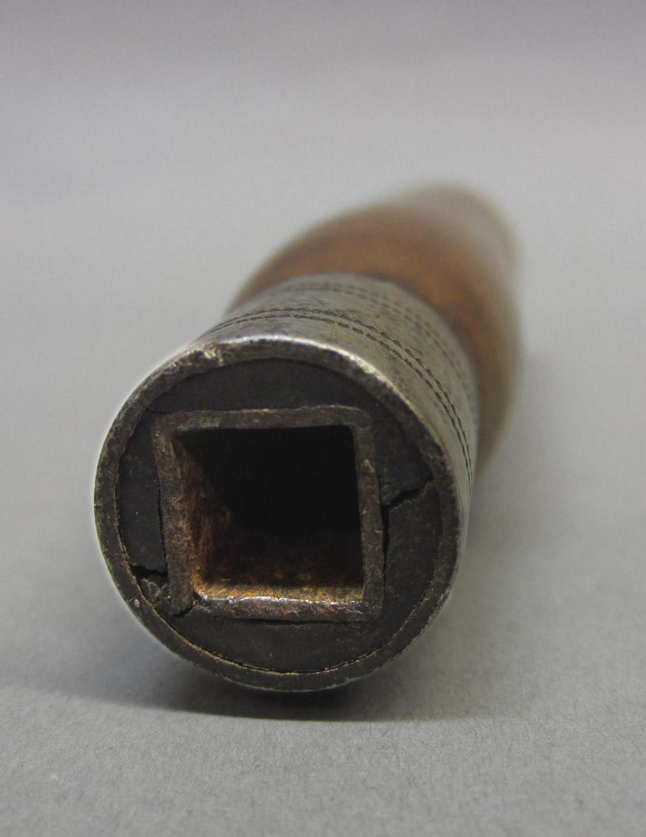 1995.0006.388 A,B Awl pad, handle top detail