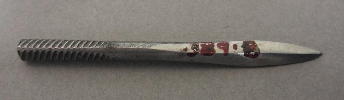 1995.0006.389 Awl pad, illegible bit