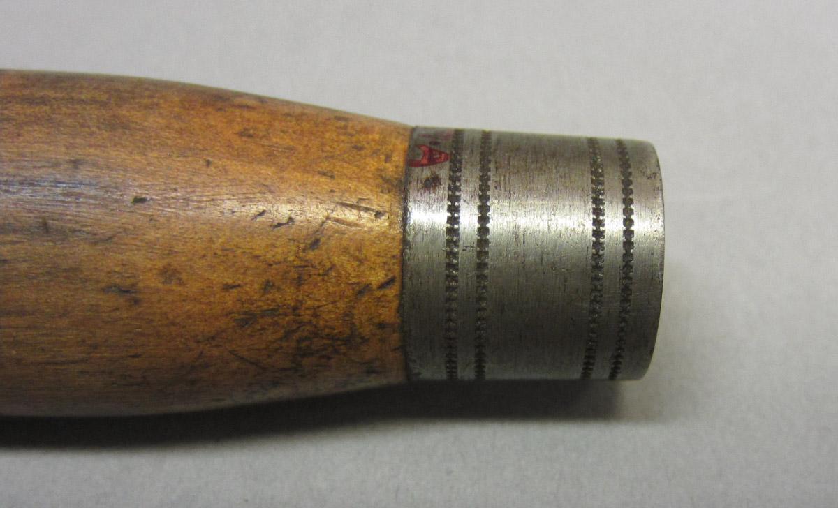 1995.0006.389 A Awl pad, handle ferrule detail