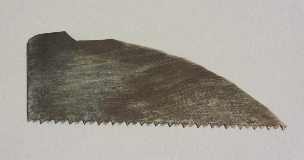 1995.0006.418 Saw Blade Fragment, Right