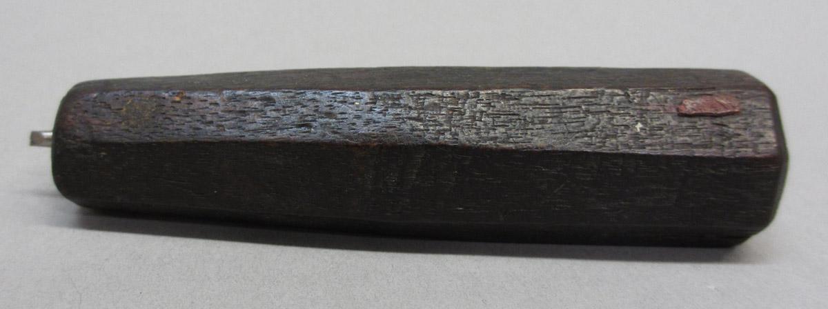 1995.0006.438 Awl, side 1