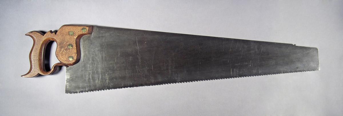 1995.0006.443, Hand saw, side 1