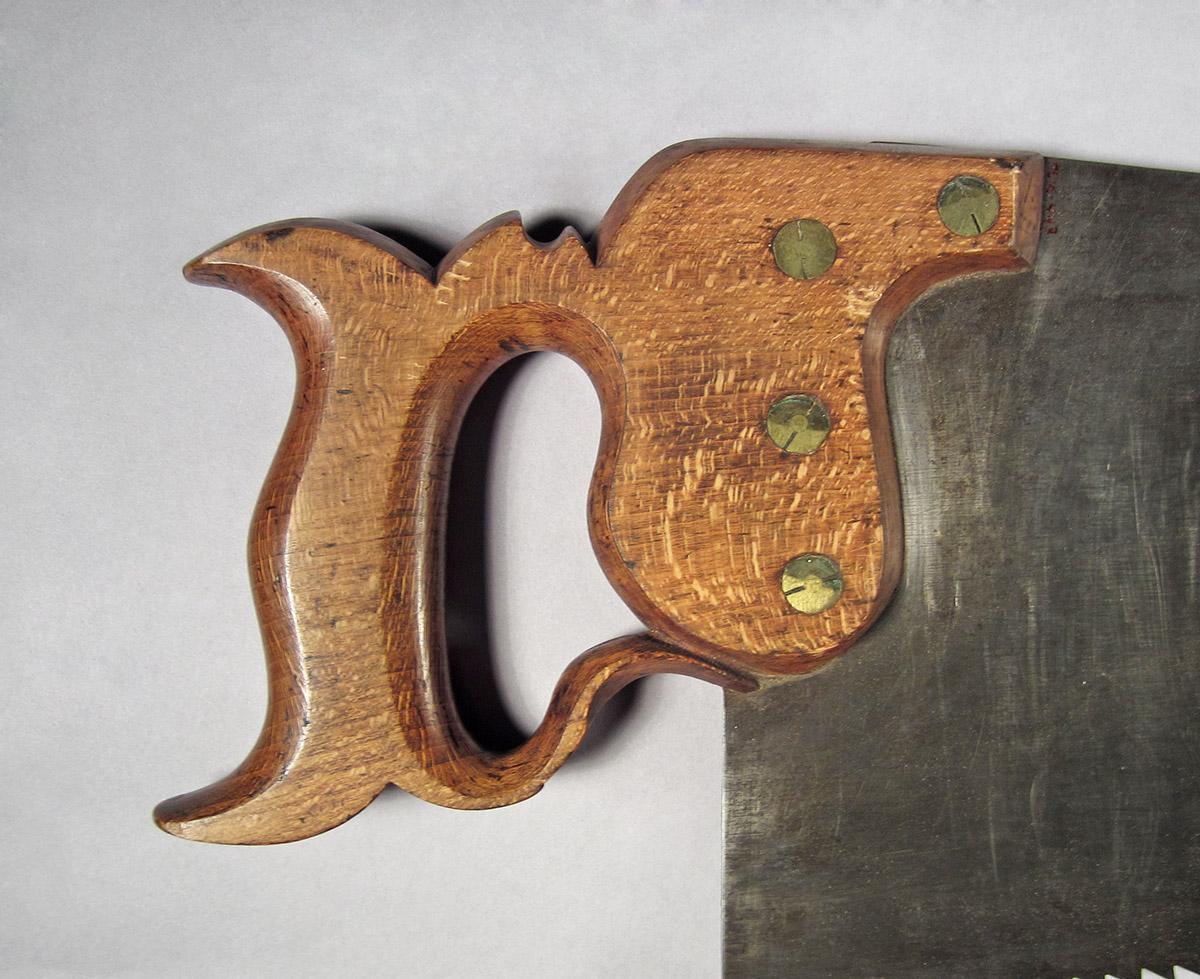 1995.0006.443, Hand saw, handle side 2