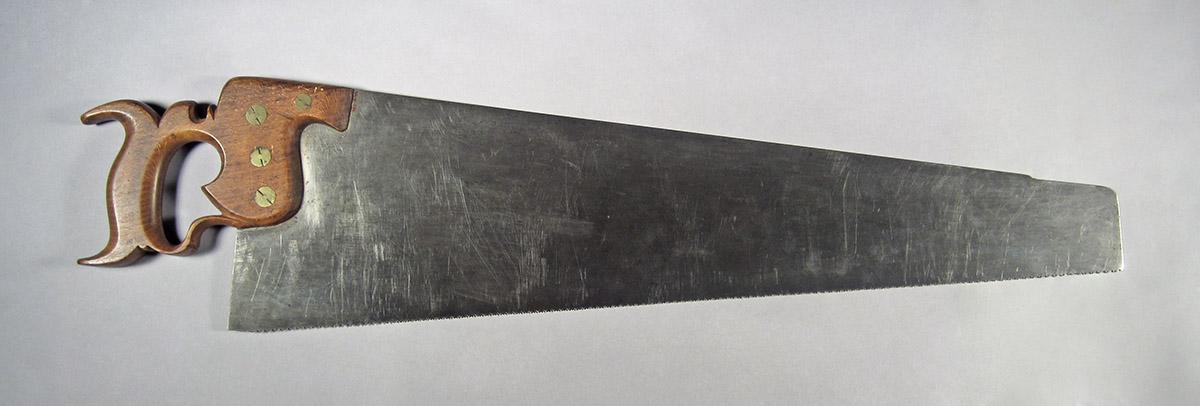 1995.0006.444, Hand saw, side 1