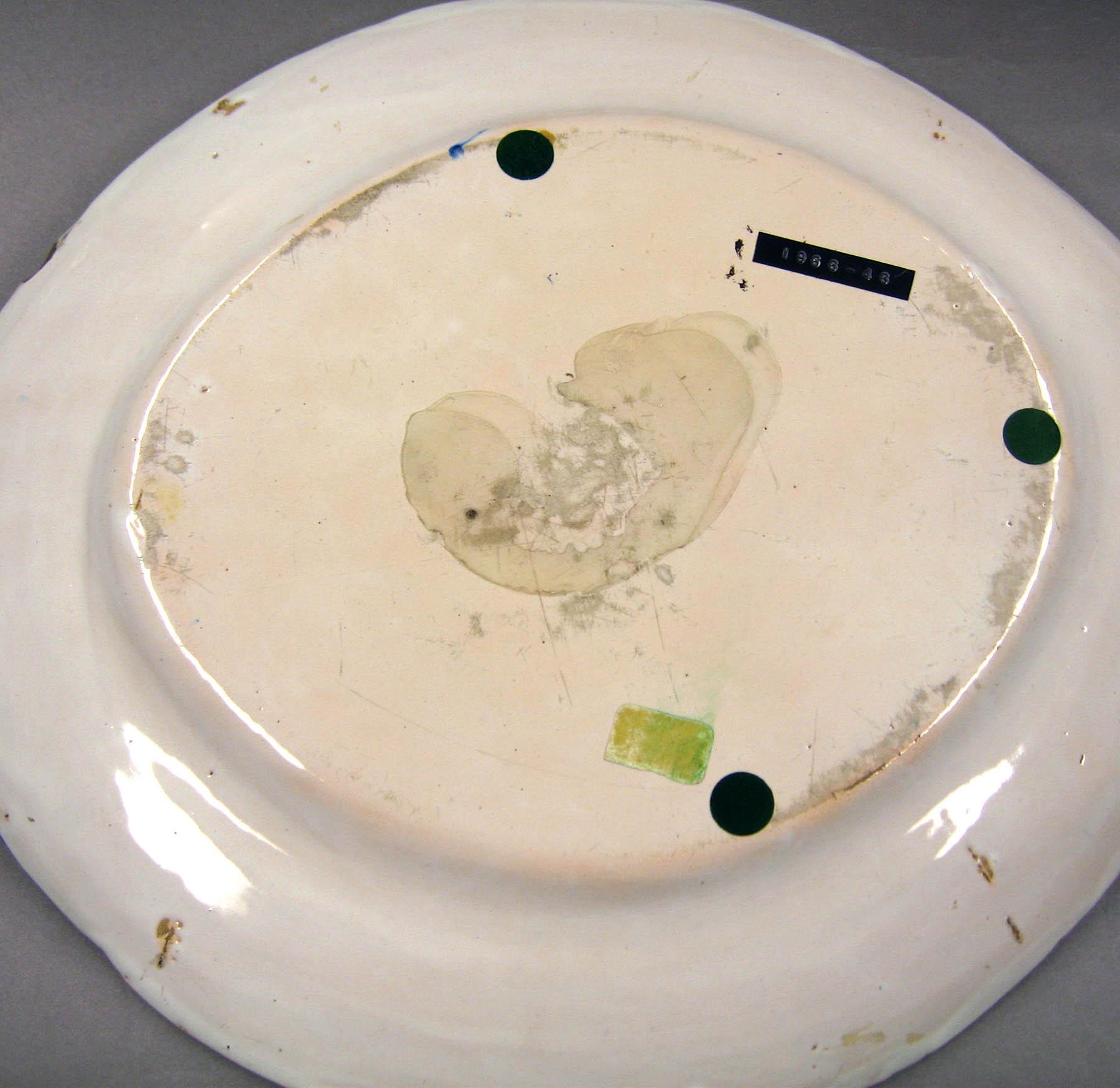 1996.0004.127 C Tin-glazed earthenware stand (underside)