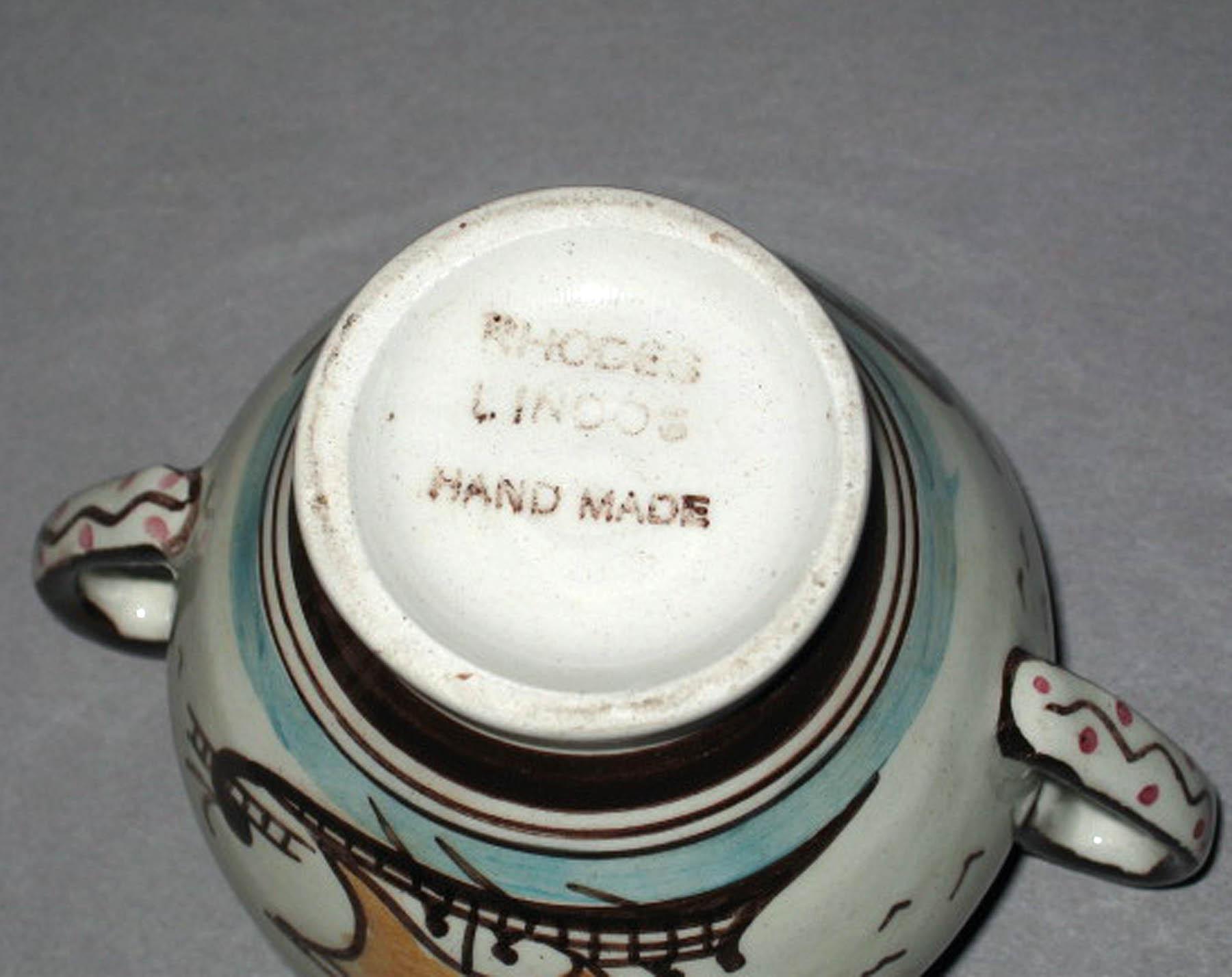 1996.0004.276.032 A, B Greek earthenware covered bowl (underside)