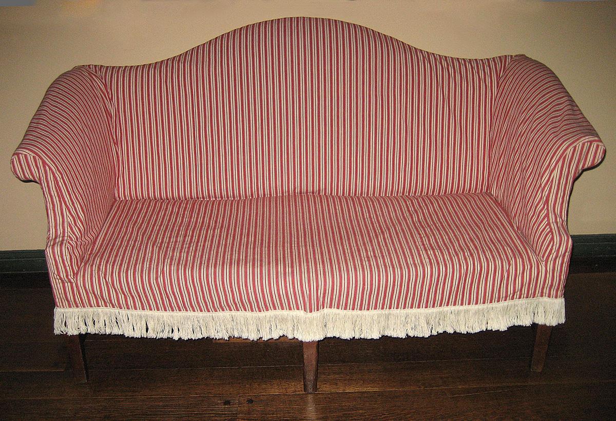 1996.0504 slip cover on sofa 1996.0008 view 1