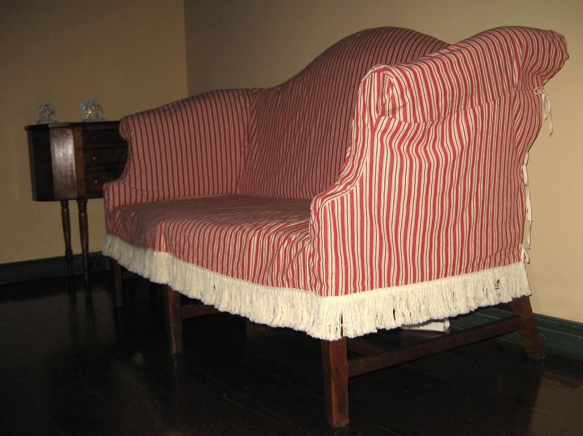 1996.0504 slip cover on sofa 1996.0008 view 2