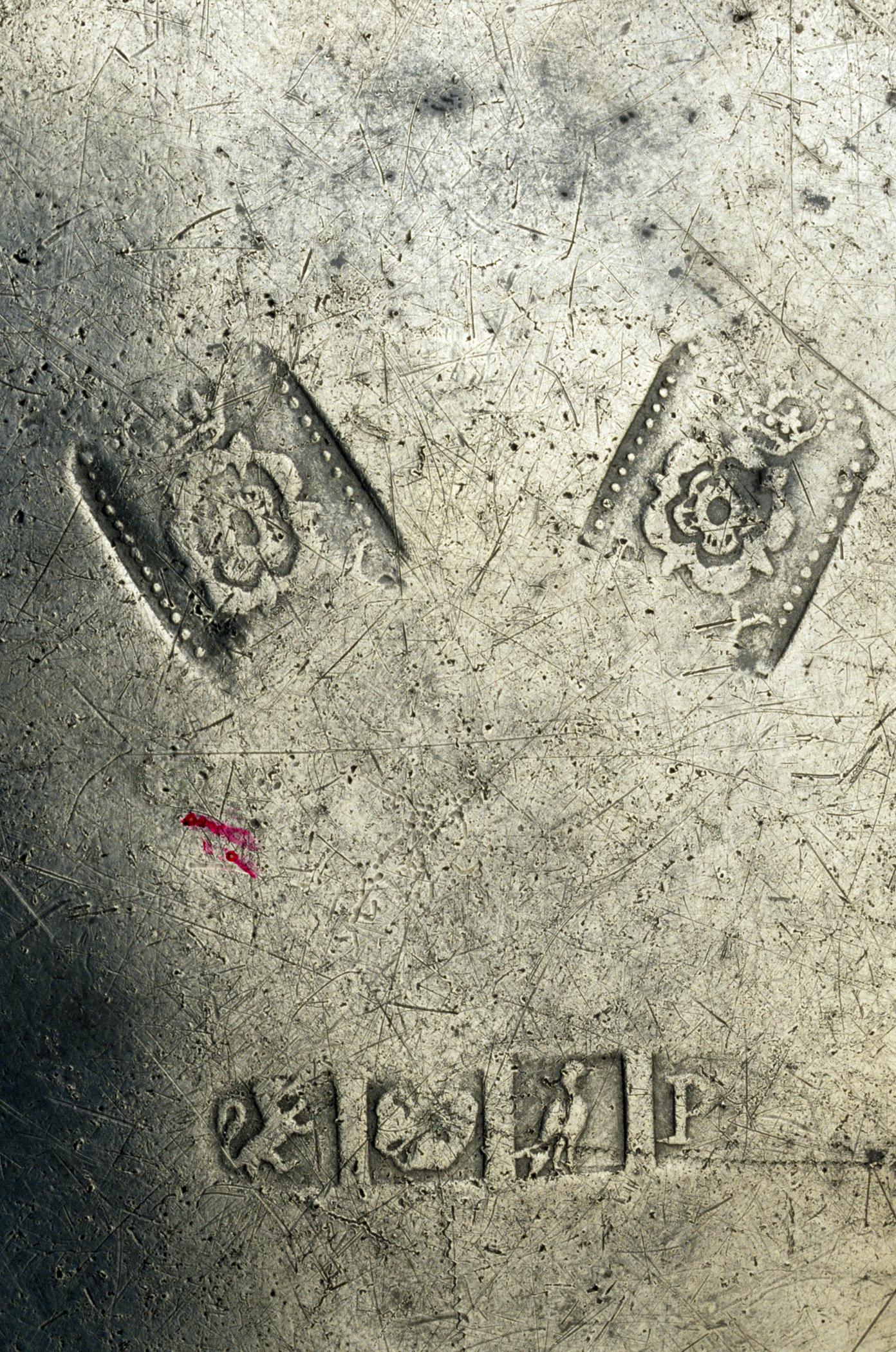 1997.007.001 Pewter plate (marks)