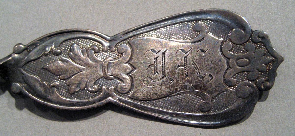 1997.0028.001 Silver Spoon engraving upper surface