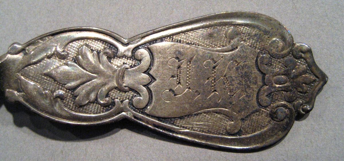1997.0028.011 Silver Spoon engraving upper surface