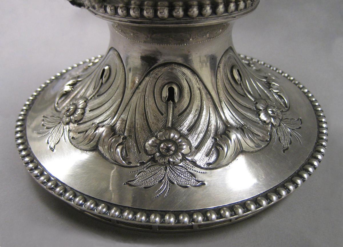 1997.0039 Silver Urn base decoration