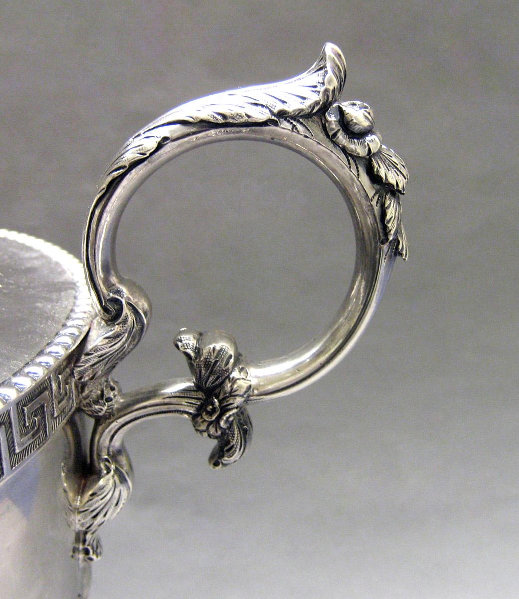 1997.0039 Silver Urn handle view 1