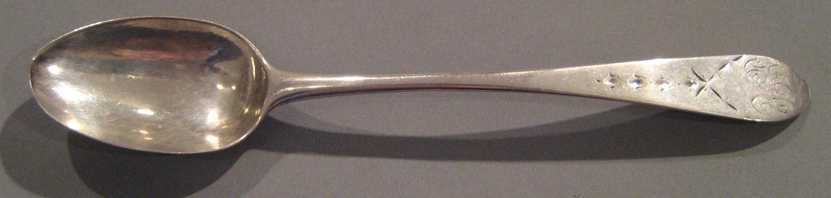 1998.0004.025.001 Silver Spoon upper surface