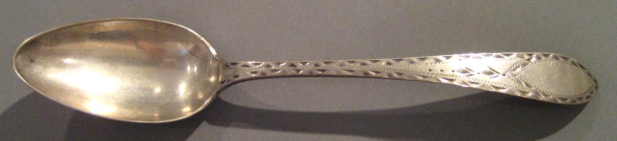 1998.0004.030.003 Silver Spoon upper surface