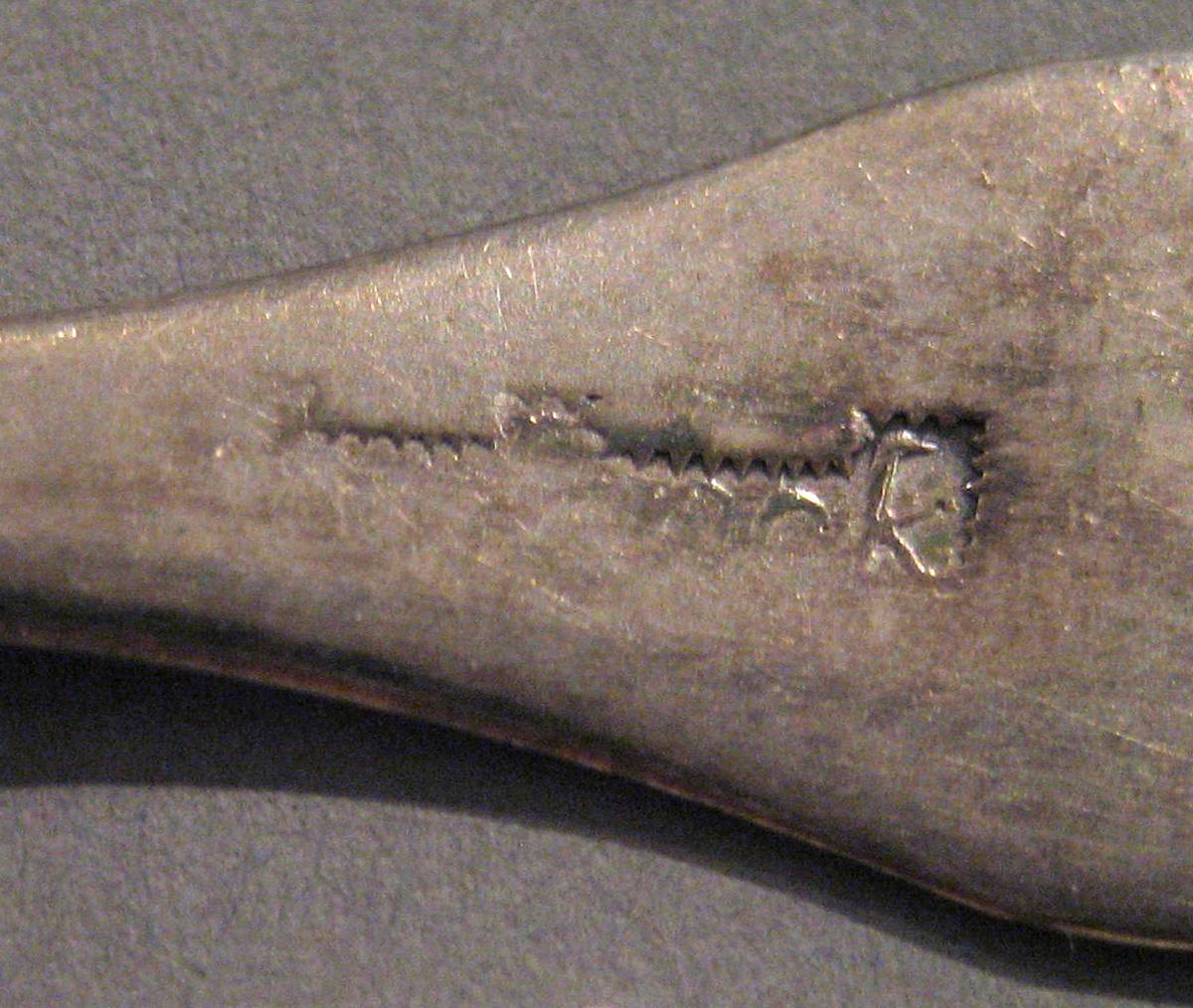 1998.0004.039 Silver Spoon marks