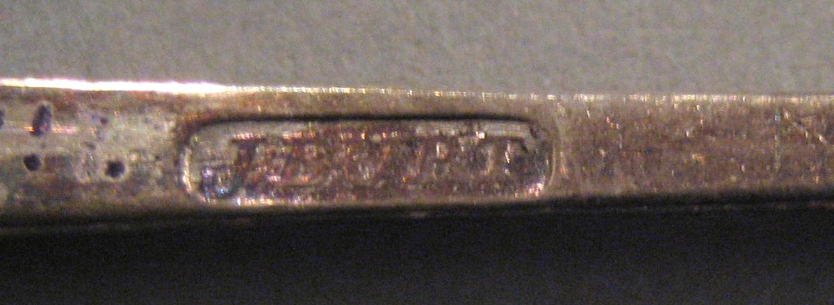 1998.0004.040 Silver Spoon marks