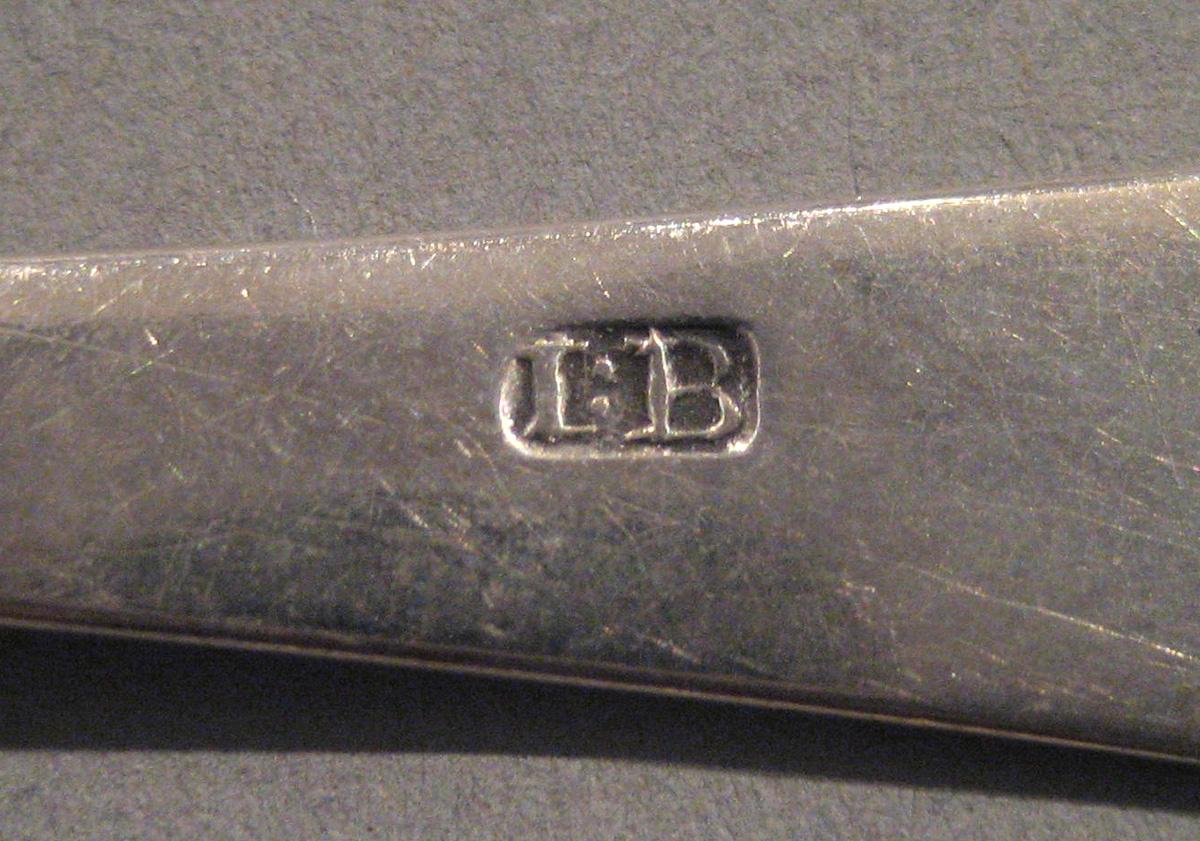 1998.0004.053 Silver Spoon marks