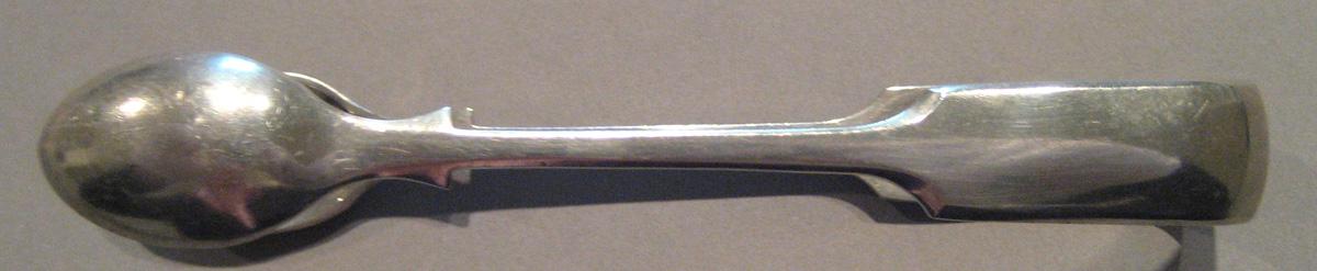 1998.0004.085 Silver Tongs side view