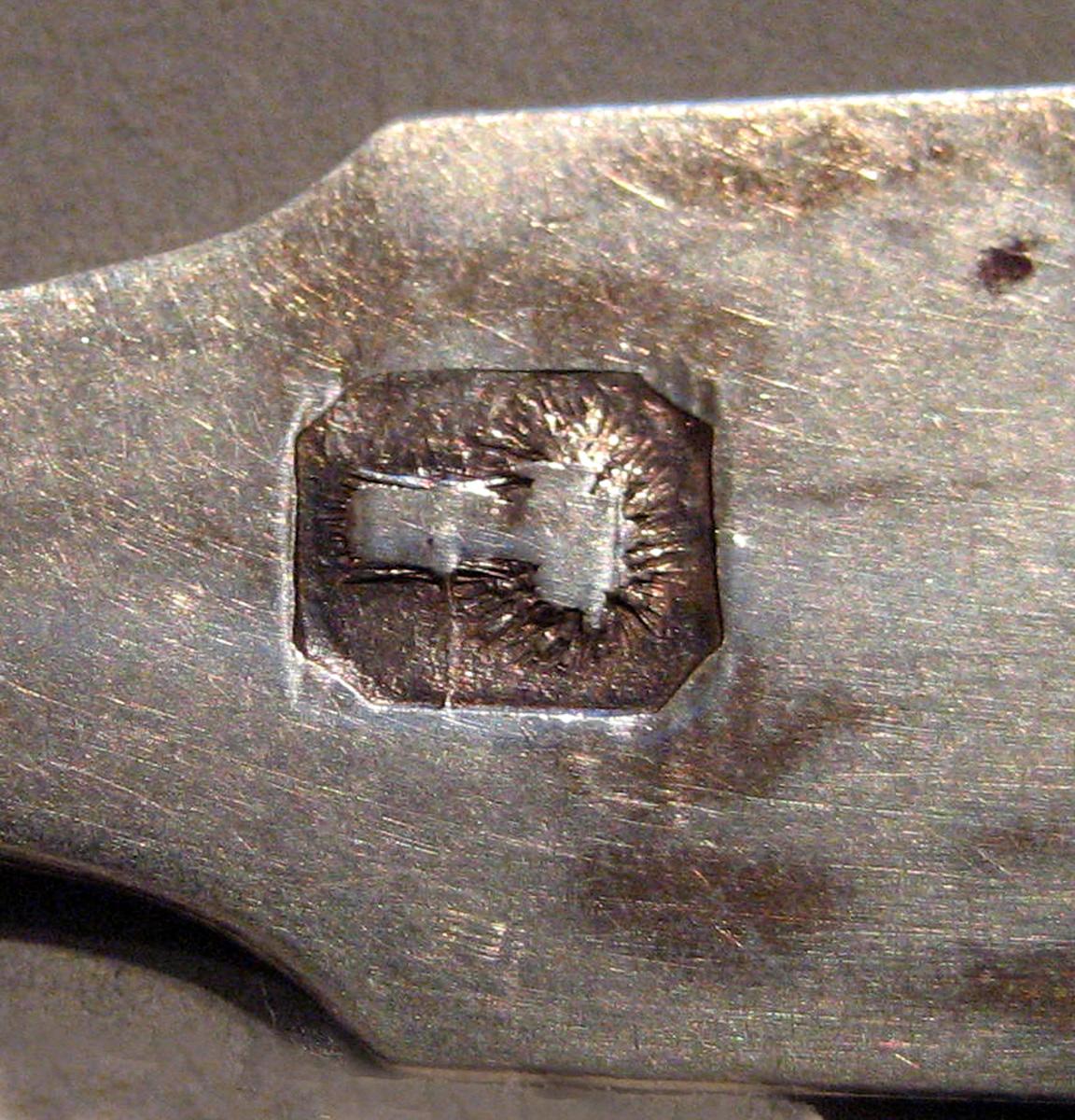 1998.0004.099.001 Silver Spoon marks