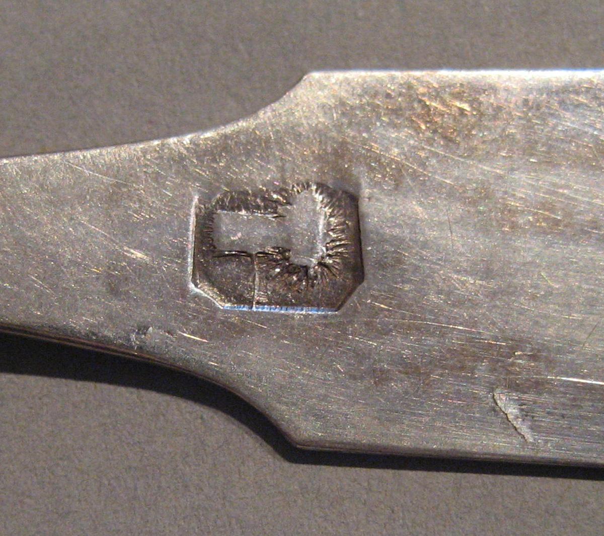 1998.0004.099.004 Silver Spoon marks