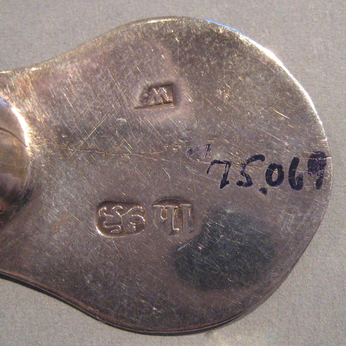 1998.0004.100 Silver Spoon marks