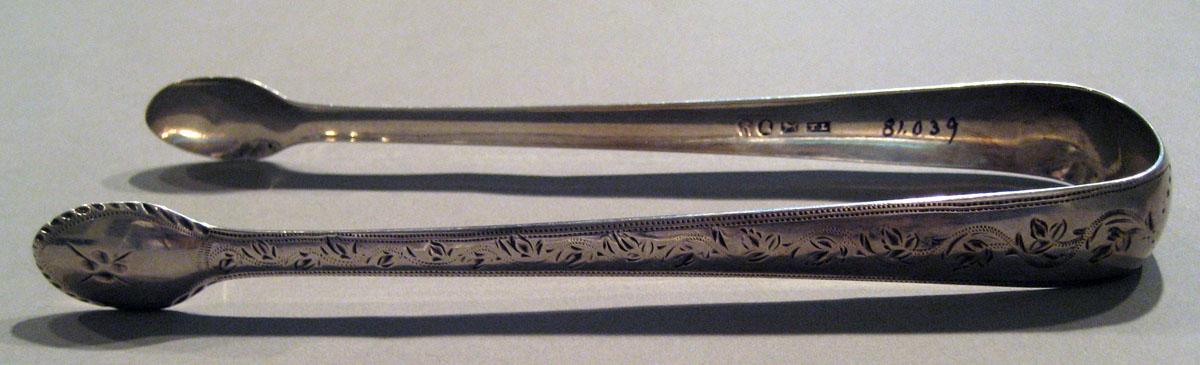 1998.0004.1044 Silver Tongs view 2