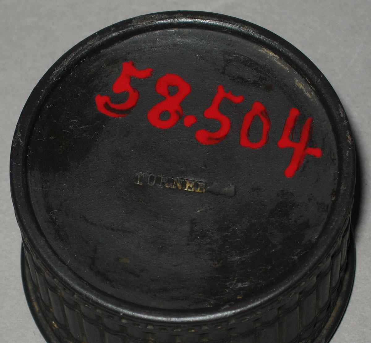 1958.0504 Black basalt inkwell (underside)