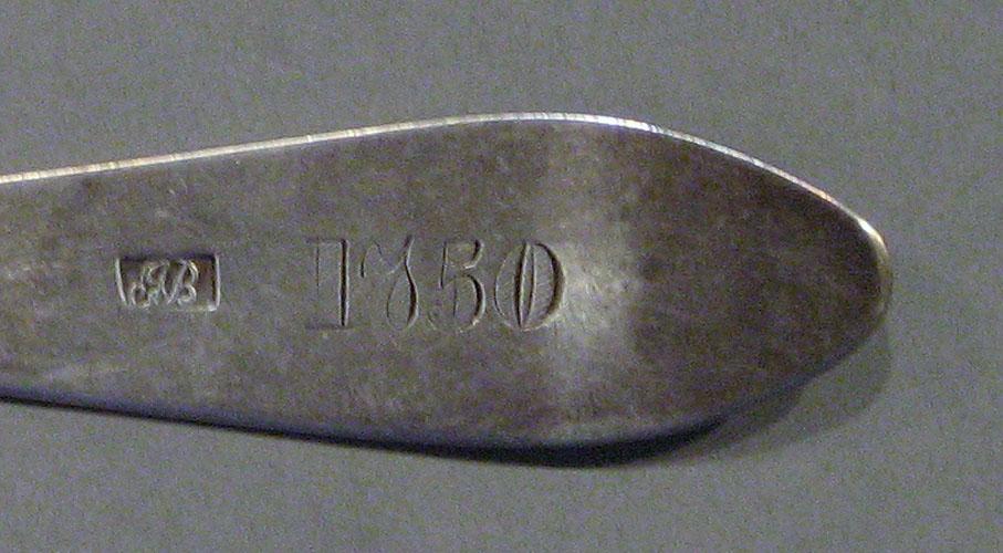 1998.0004.1115.001 spoon marks