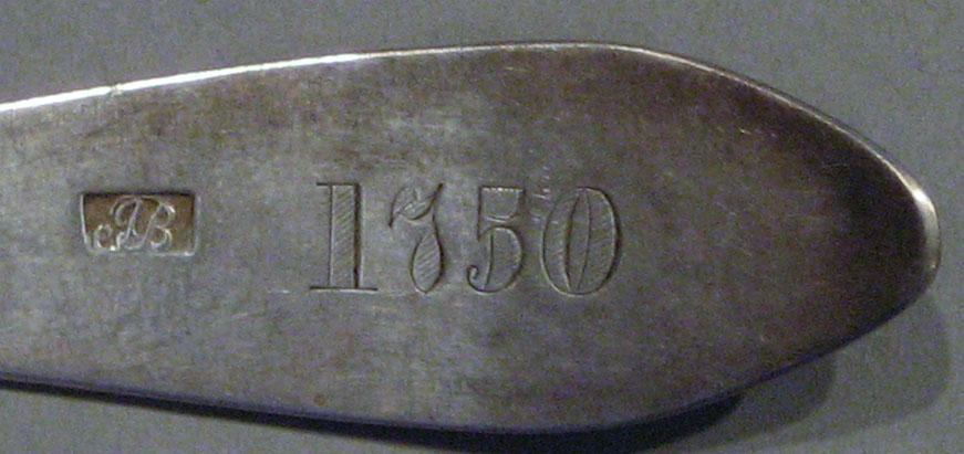 1998.0004.1115.002 spoon marks
