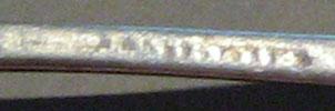 1998.0004.1154.001 spoon mark