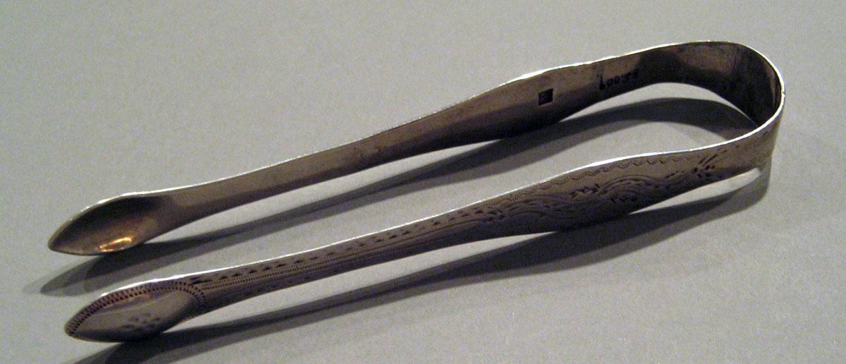 1998.0004.1531 Silver Tongs view 1