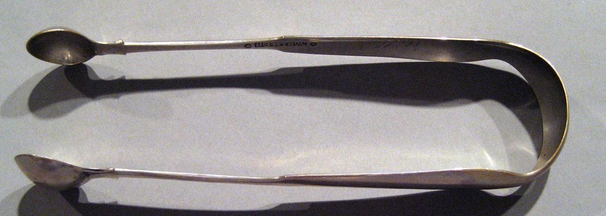1998.0004.161 Silver Tongs view 1