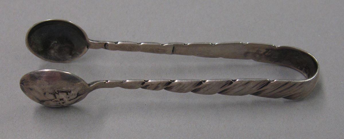 1998.0004.1854 tongs side one