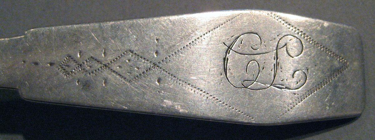 1998.0004.295.001 Silver Spoon engraving