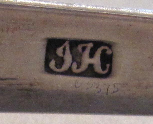 1998.0004.3100 spoon marks1