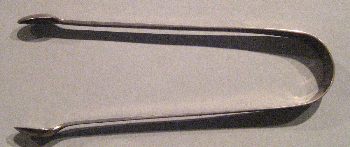 1998.0004.316 Silver Tongs view 1