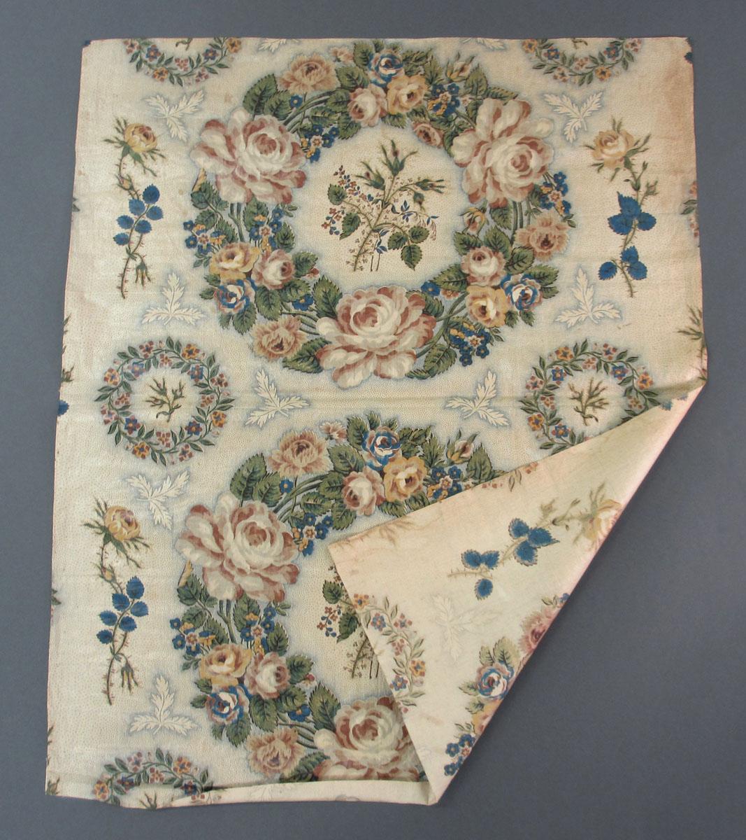 1958.0614 Textile, printed folded corner
