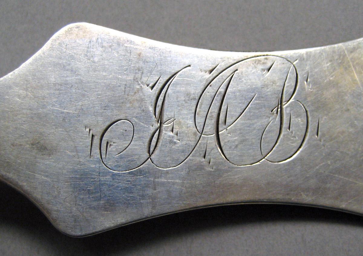 1998.0004.3412 Silver spoon engraving